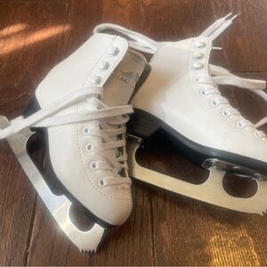 White figure Ice Skates Lake Placid